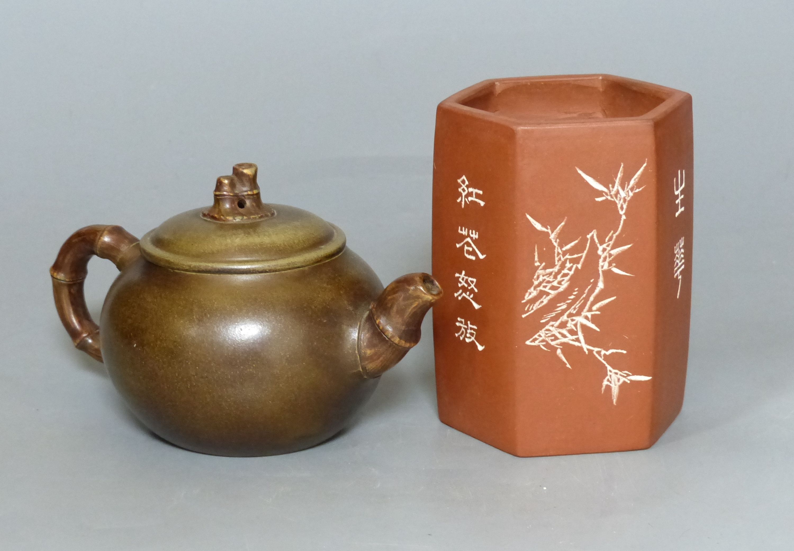 A Chinese Yixing teapot and brush pot with calligraphy and signatures, tallest 12cm